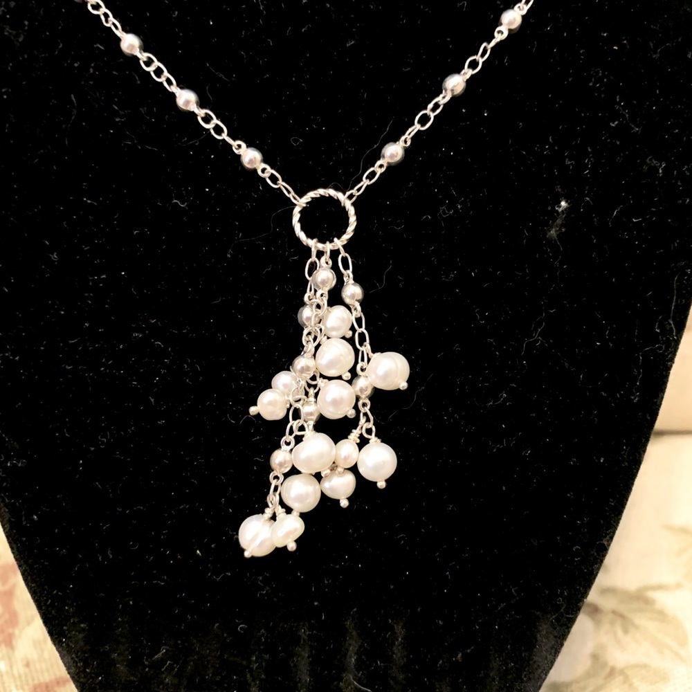 Faux pearl necklace.